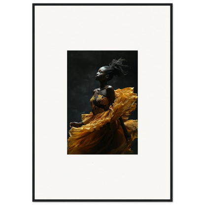 Striking photograph of a person in flowing yellow fabric against a dark background.