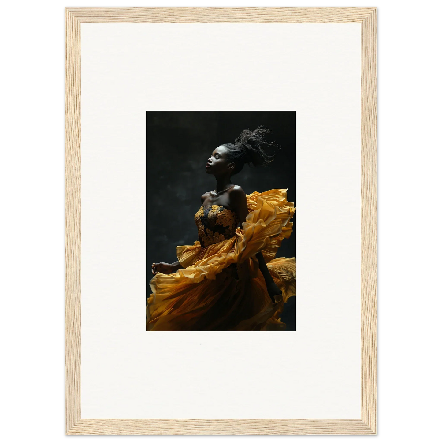 Dramatic photograph of a person in flowing golden fabric against a dark background.