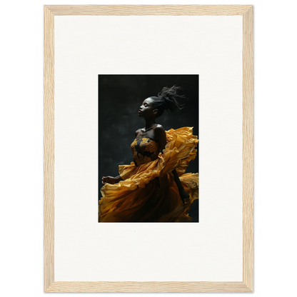 Dramatic photograph of a person in flowing golden fabric against a dark background.