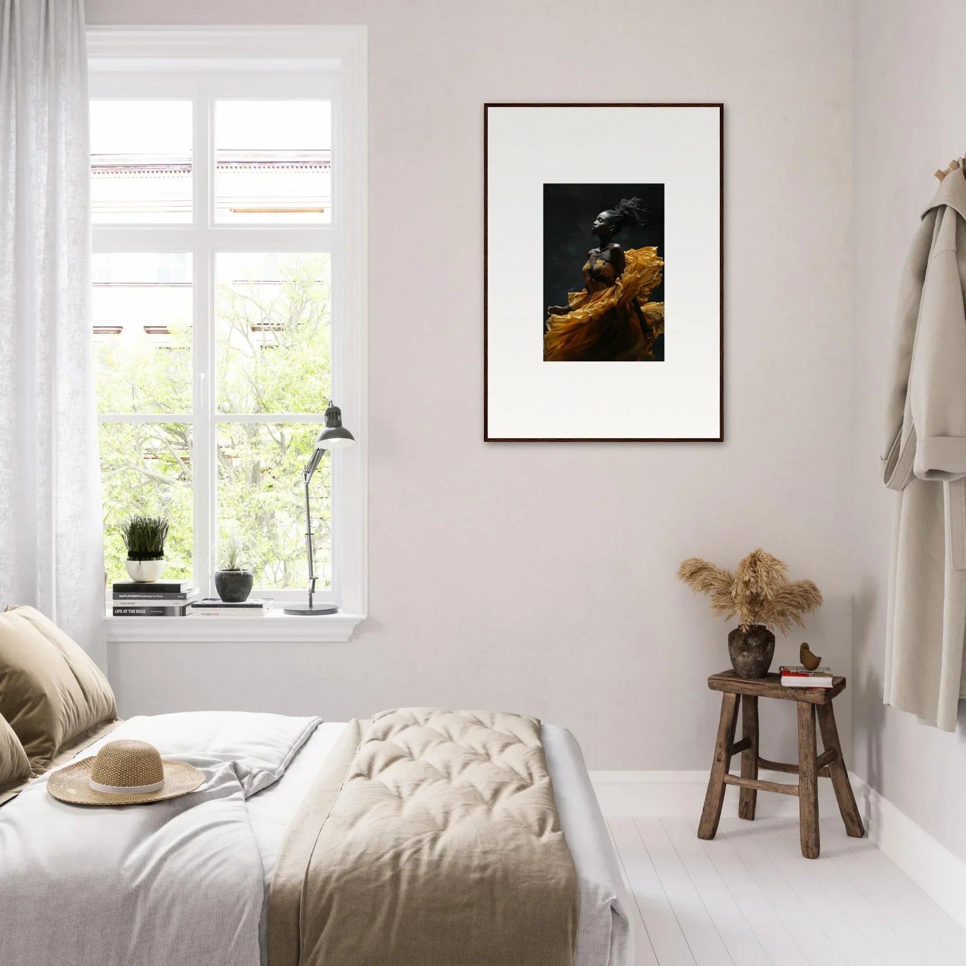 Cozy bedroom with neutral decor and a framed artwork on the wall.