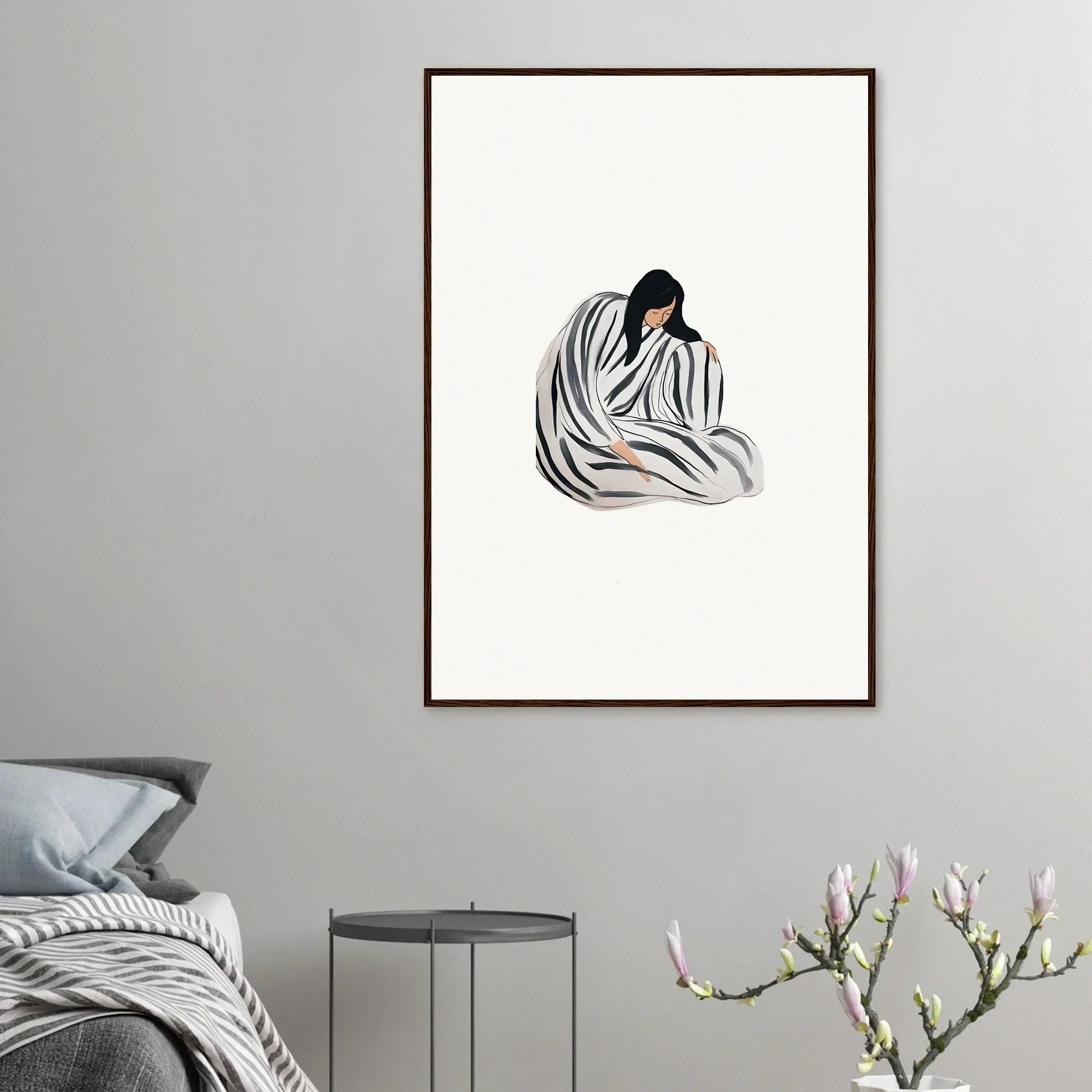 Minimalist room decoration canvas print of a person in a striped blanket huddled