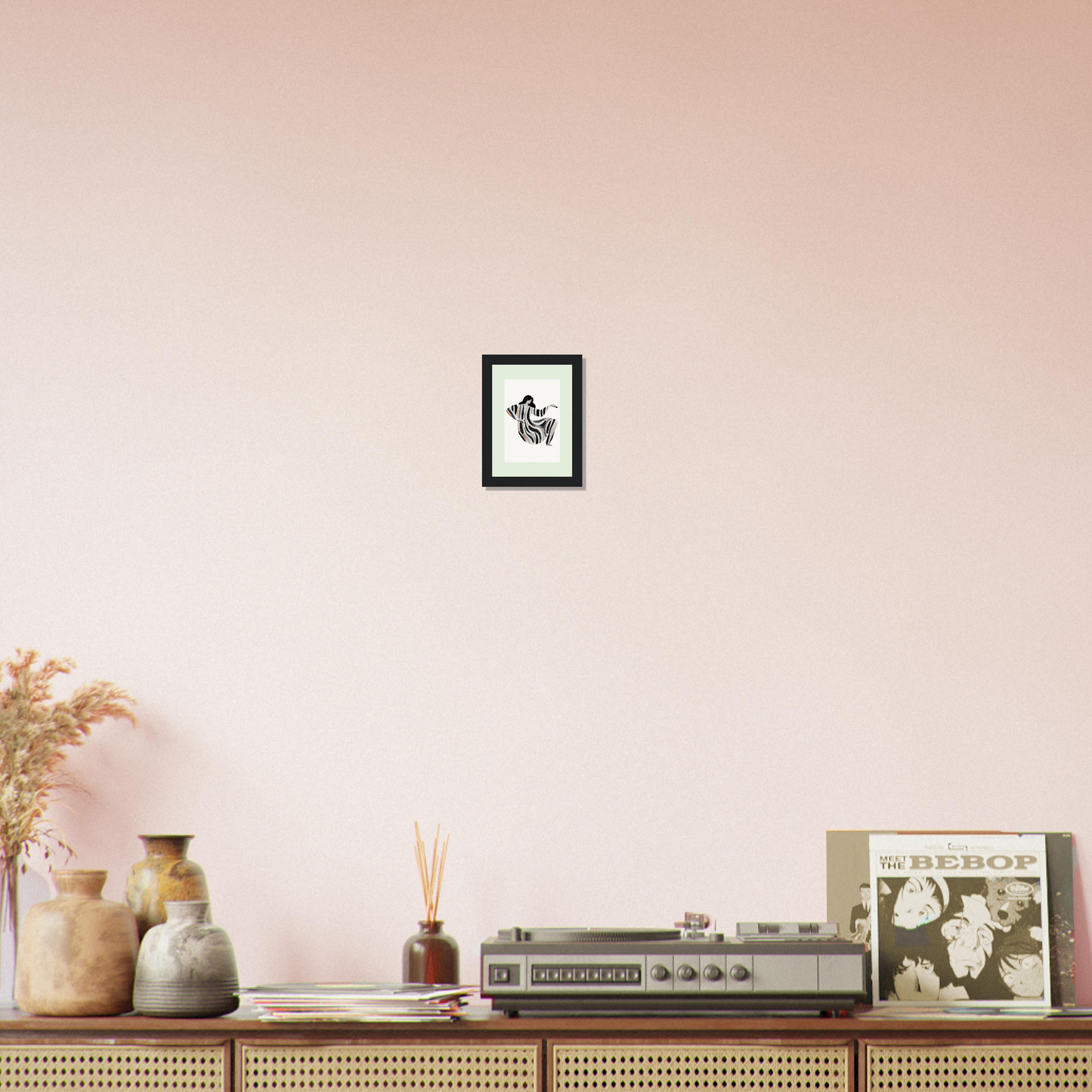 Wooden sideboard or console table with decorative items displayed on top.