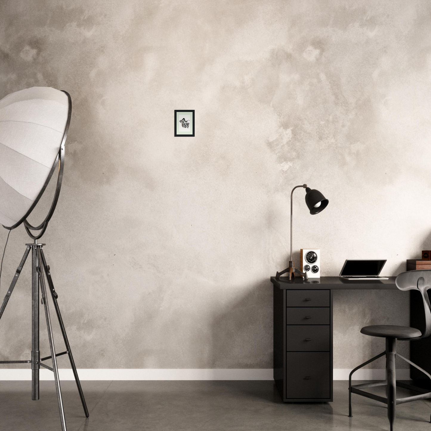 Minimalist home office workspace with a desk, chair, and photography lighting equipment.