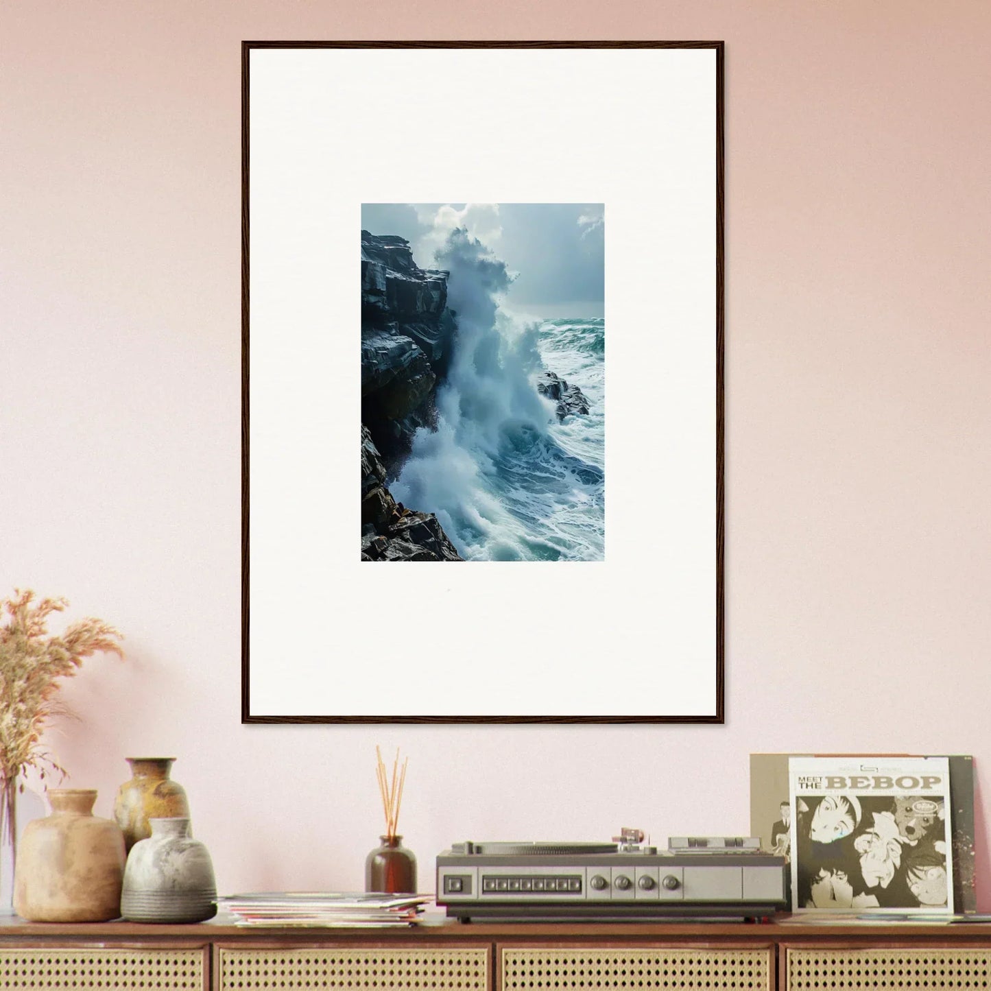 Framed wall art of crashing ocean waves on rocky cliffs, perfect for room decor