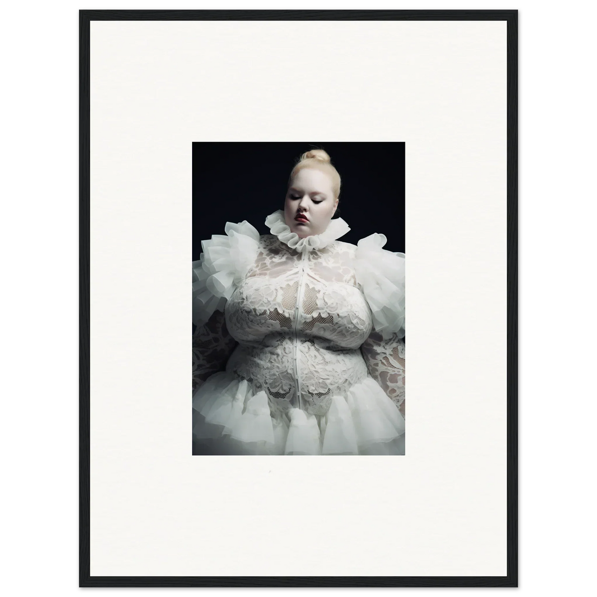 Pale figure in an elaborate white ruffled costume against a dark background.