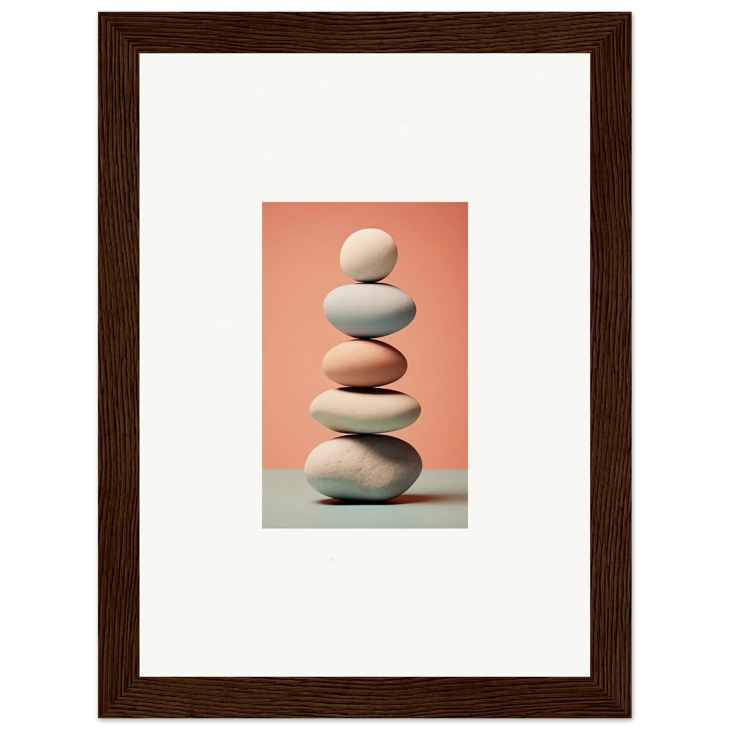 Stack of balanced smooth stones in pink and white for marble sands room decoration