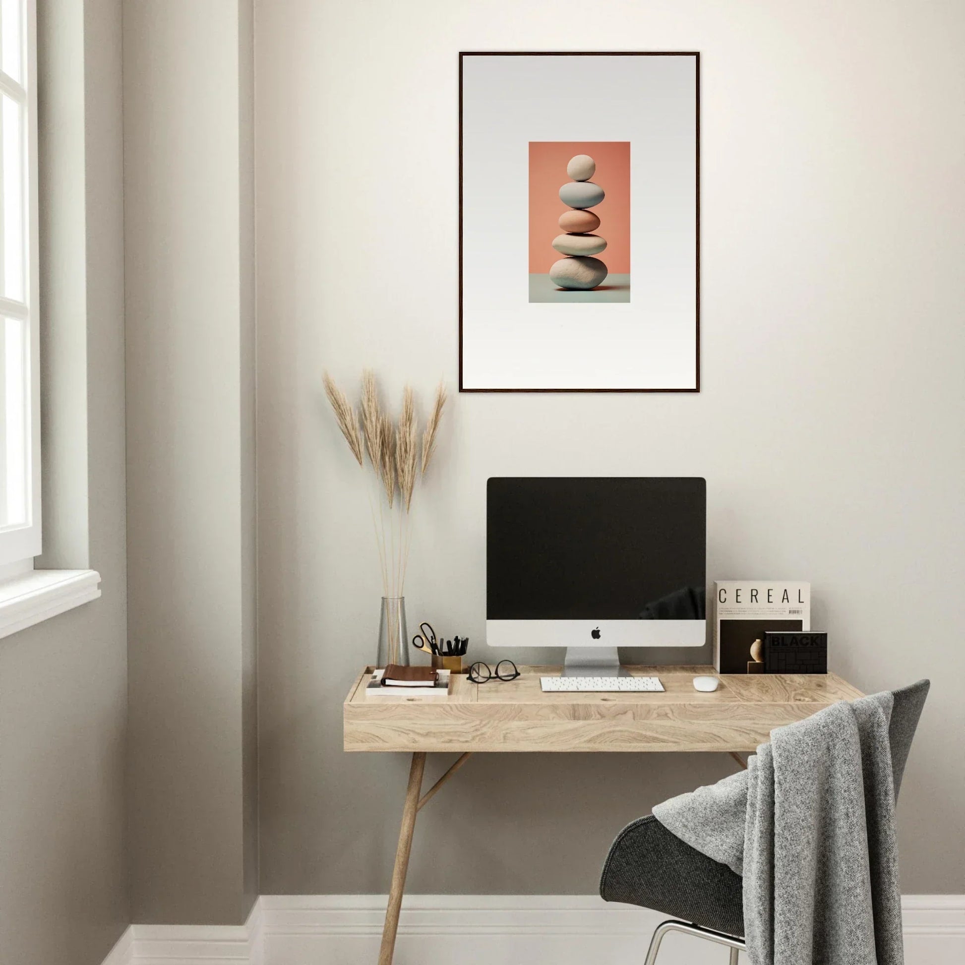 Minimalist home office with wooden desk, computer, and marble sands canvas print decor