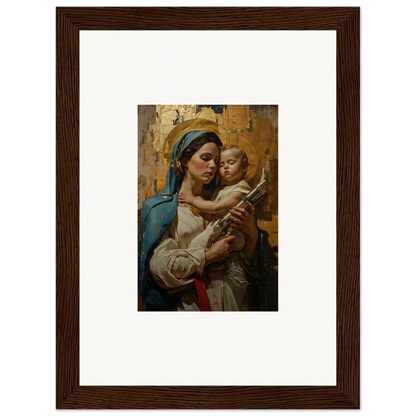 Framed wall art of a woman in blue holding a baby, ideal for room decor