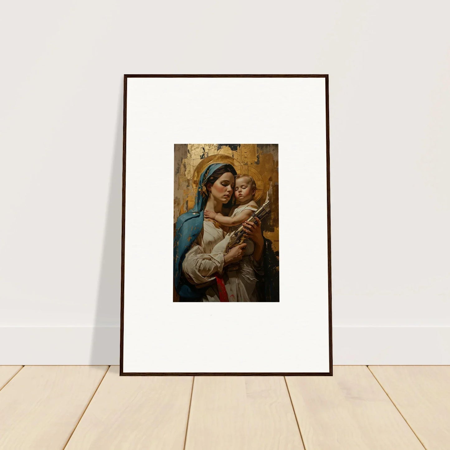 Framed wall art of a woman in blue holding a baby, perfect for room decor