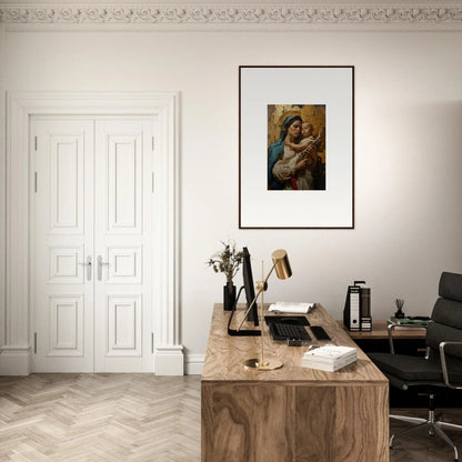 Home office workspace with wooden desk, chair, and framed wall art for stylish room decor