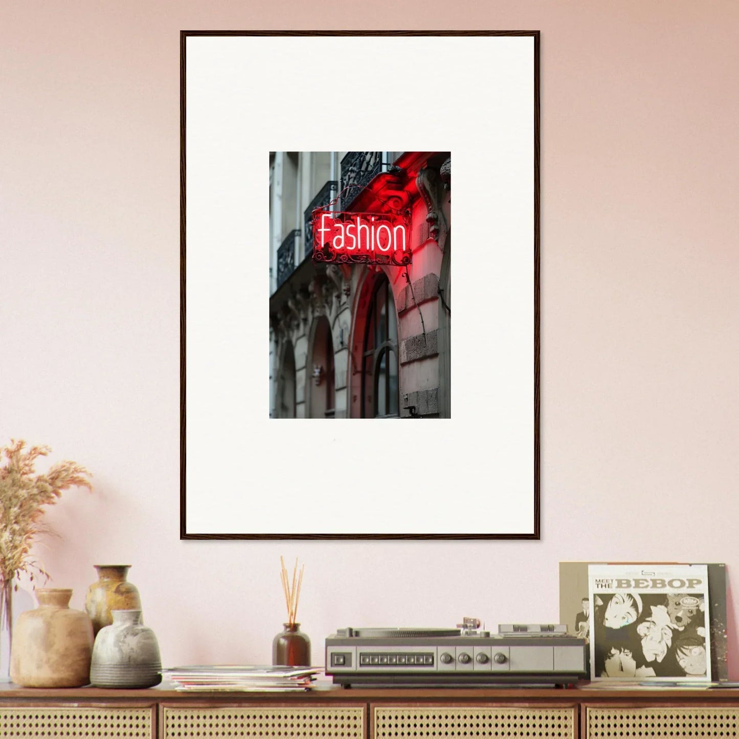 Framed wall art of a glowing red neon Fashion sign for stylish room decor