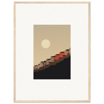 Framed wall art of houses on a hillside under a full moon for serene room decor