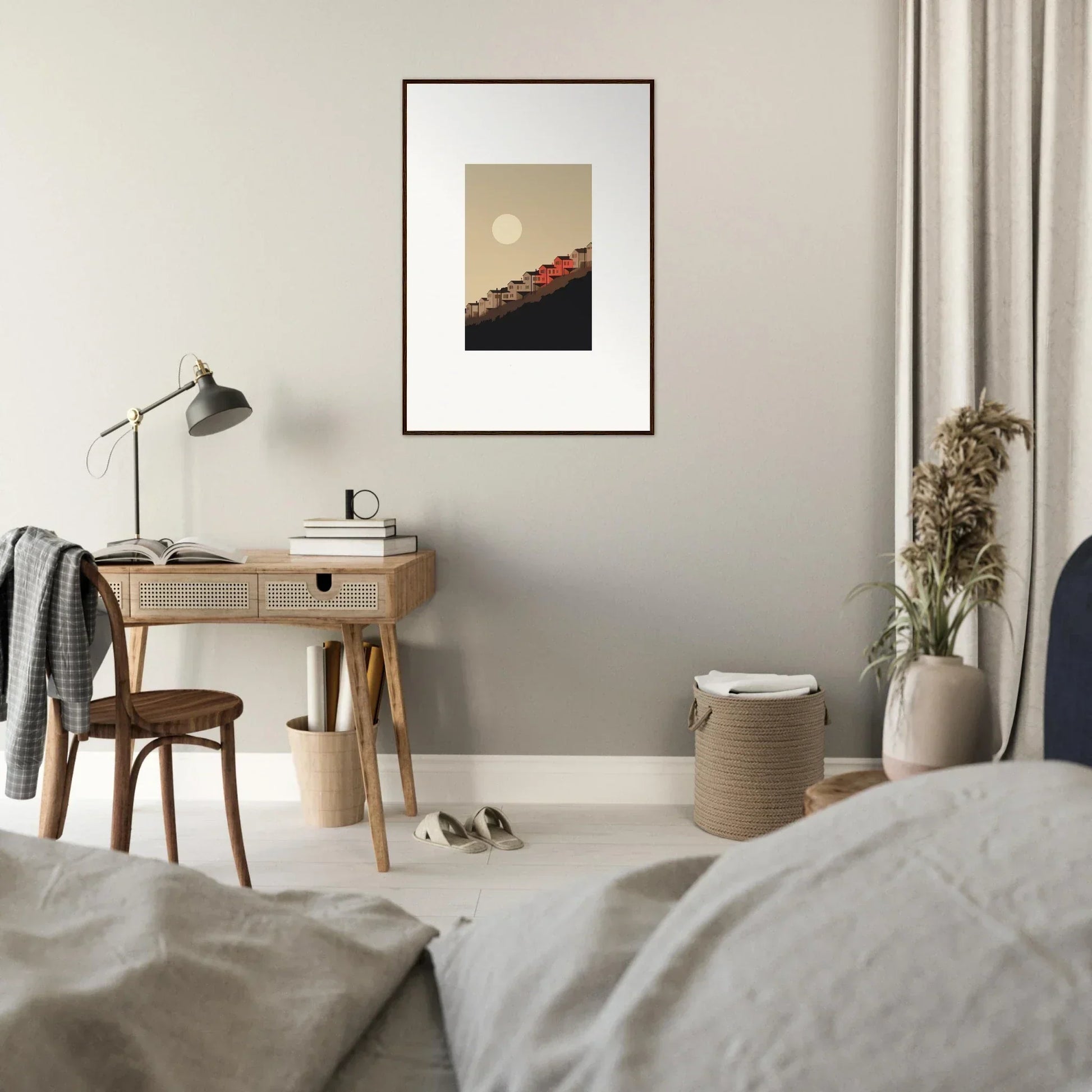 Framed wall art featuring a sun over a red-roofed structure for room decor and whisper manifestation