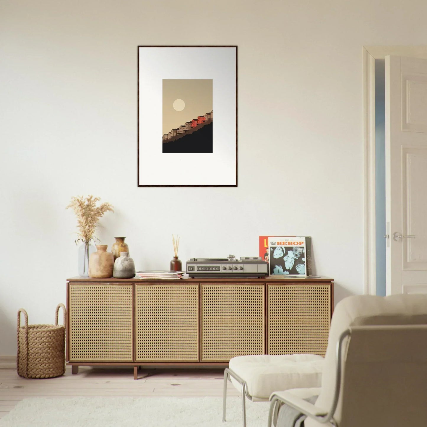 Wooden sideboard with cane-webbed doors enhancing room decor and whisper manifestation vibes