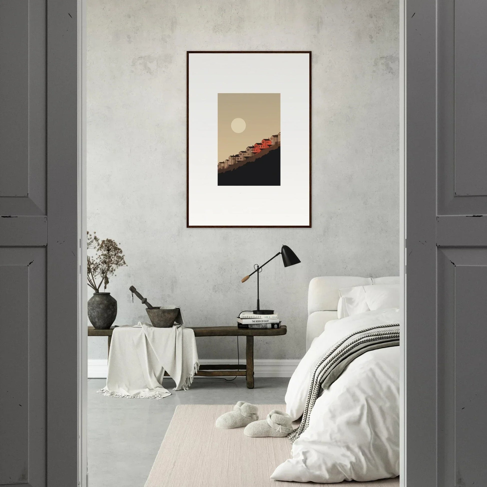 Minimalist bedroom with framed wall art as focal point for serene room decor