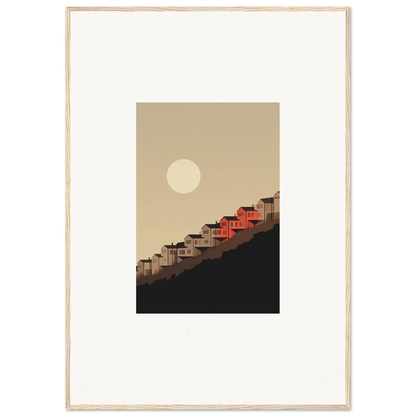 Framed wall art of red-roofed houses under a full moon for serene room decor