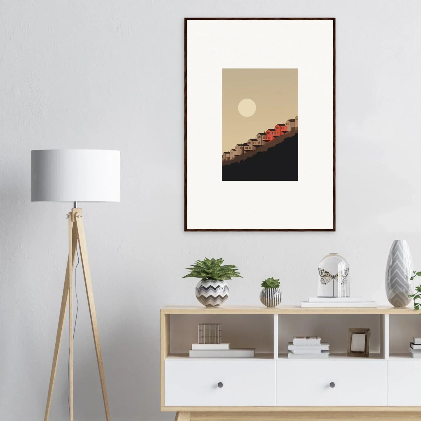 Framed wall art of minimalist moon over red rooftops for room decor and whisper manifestation