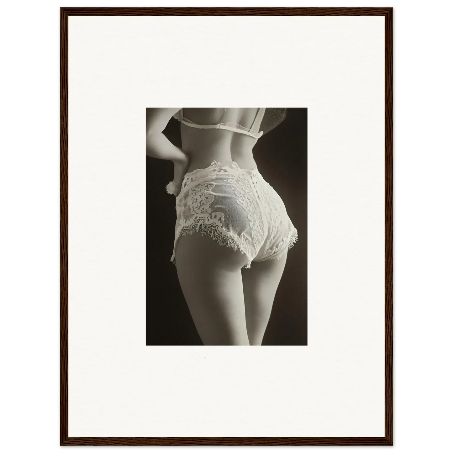 Framed black and white canvas print of lace curvature on a woman’s lower back for room decoration