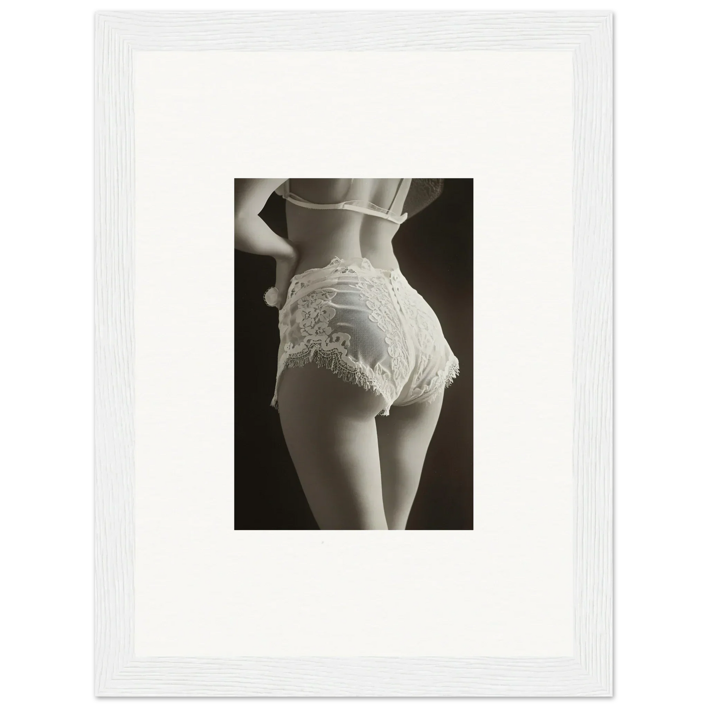 Framed black and white canvas print of lace curvature on woman’s lower back for room decoration