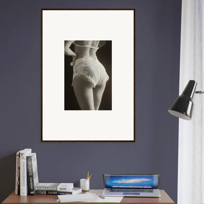 Framed black and white canvas print of lace curvature highlighting a woman’s hips