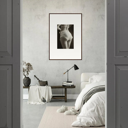 Minimalist bedroom with lace curvature canvas print and a framed black and white nude