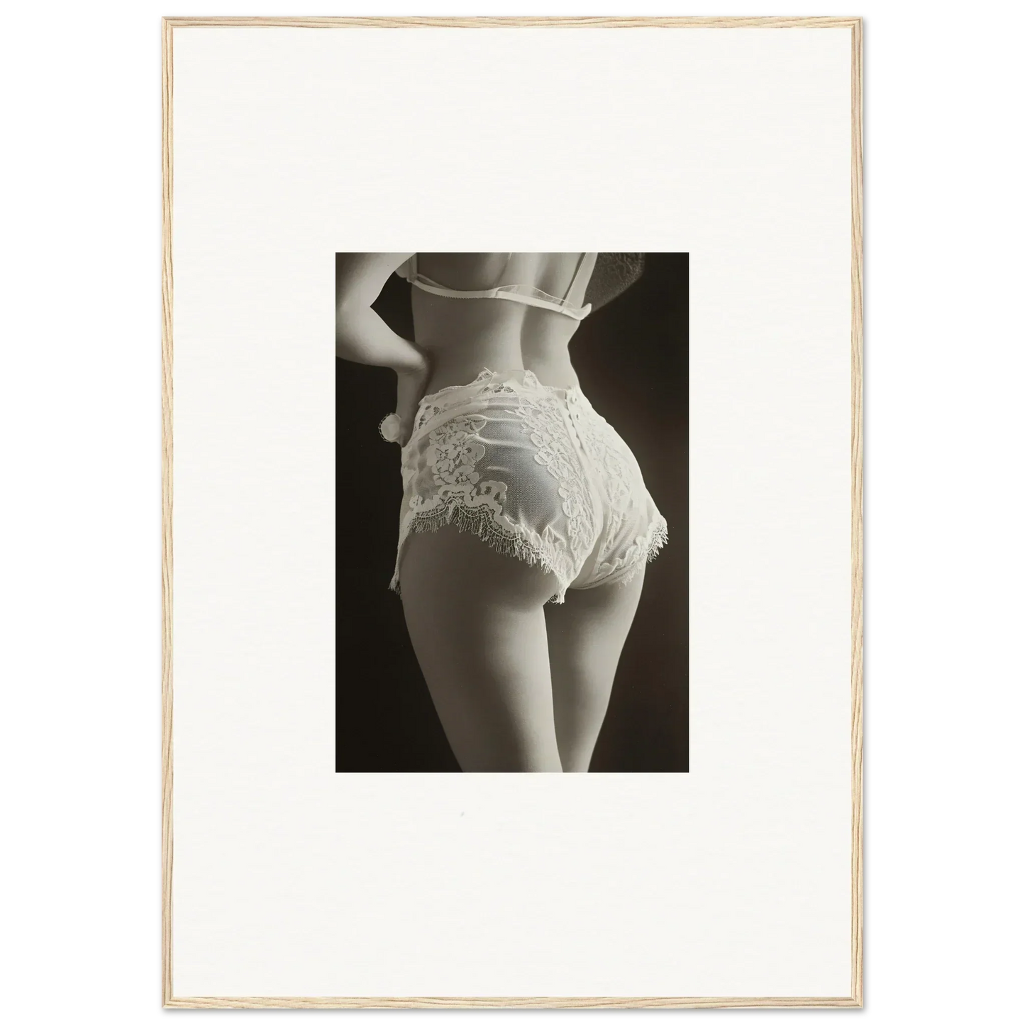 Lower torso in lacy white underwear showcasing lace curvature for chic room decoration