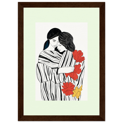 Framed artwork depicting two embracing figures surrounded by stylized red and yellow flowers.