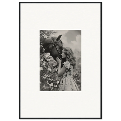 Black and white photo of a girl smelling a flower, perfect for Lunar Reverie room decoration