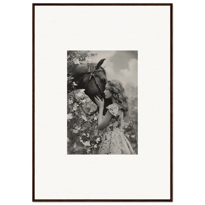 Framed black and white photo of a girl with a flower for Lunar Reverie room decoration