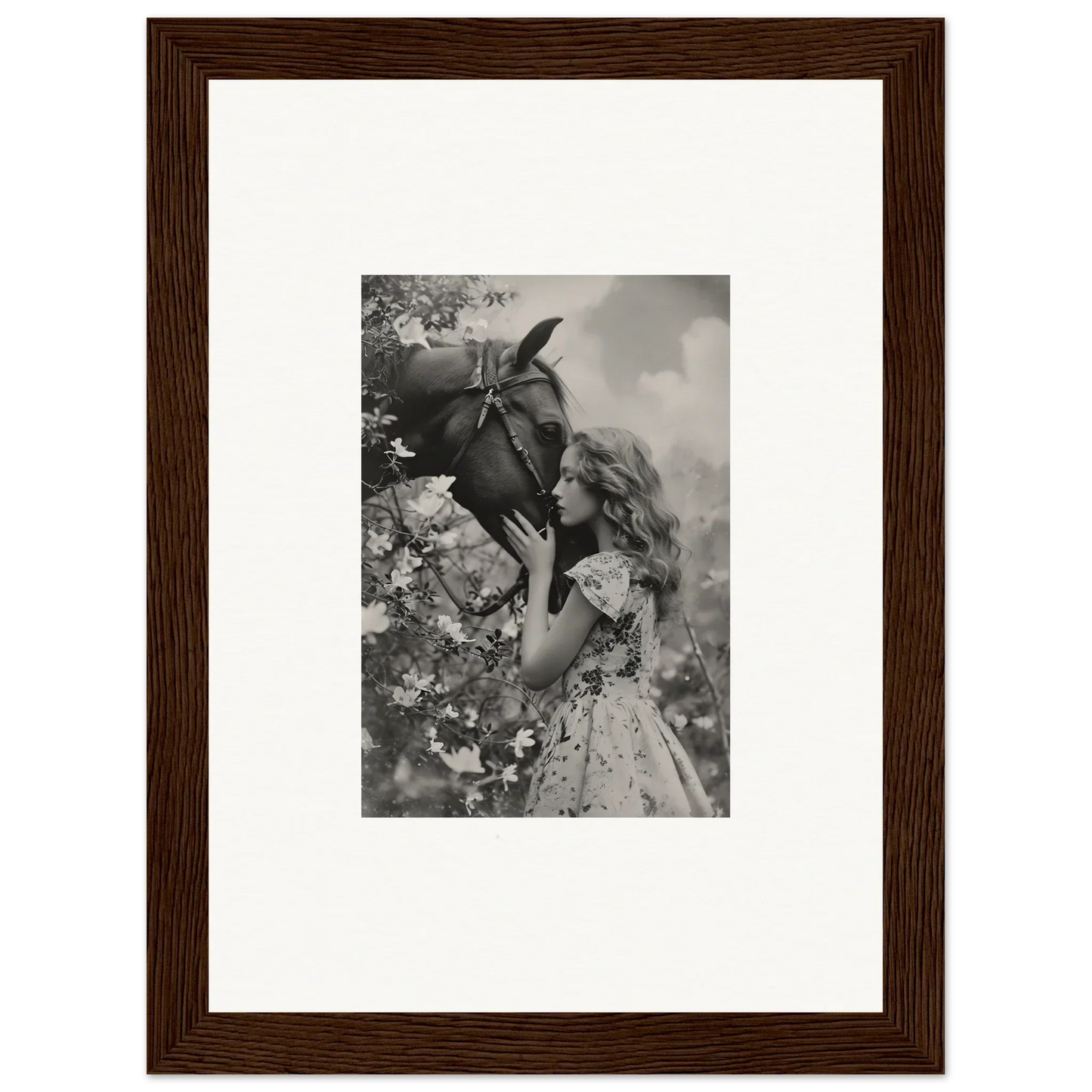 Framed black and white photo of girl smelling a flower, perfect for your Lunar Reverie room decoration