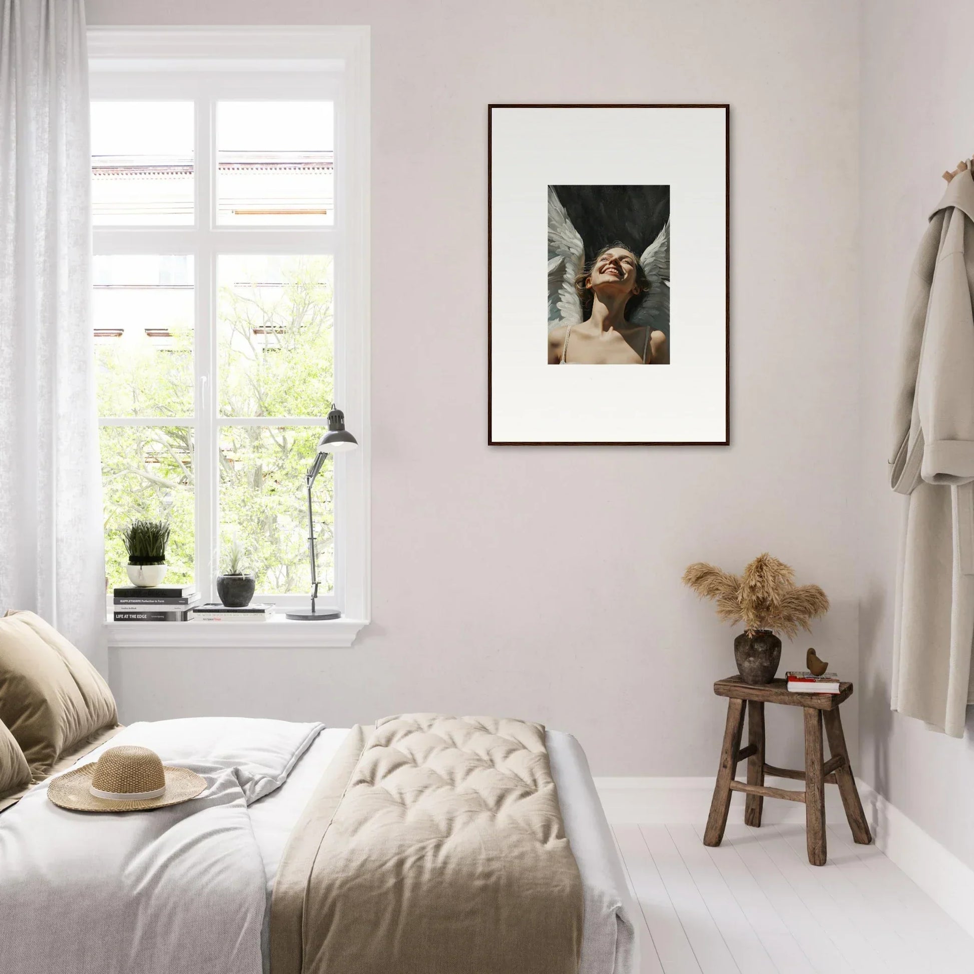 Cozy bedroom with neutral decor featuring stylish wall art and a canvas print