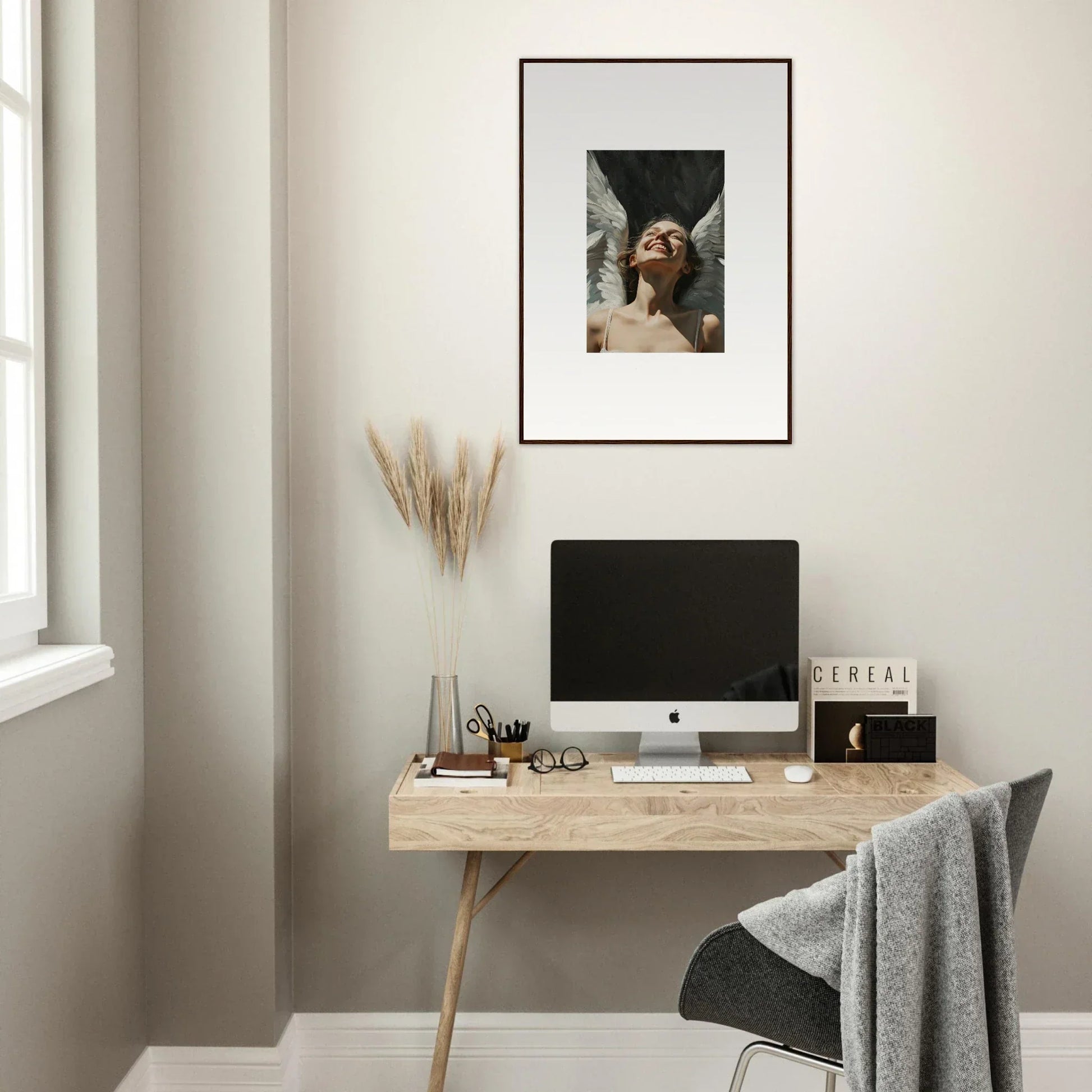 Minimalist wooden desk with computer and stunning wall art for room decoration