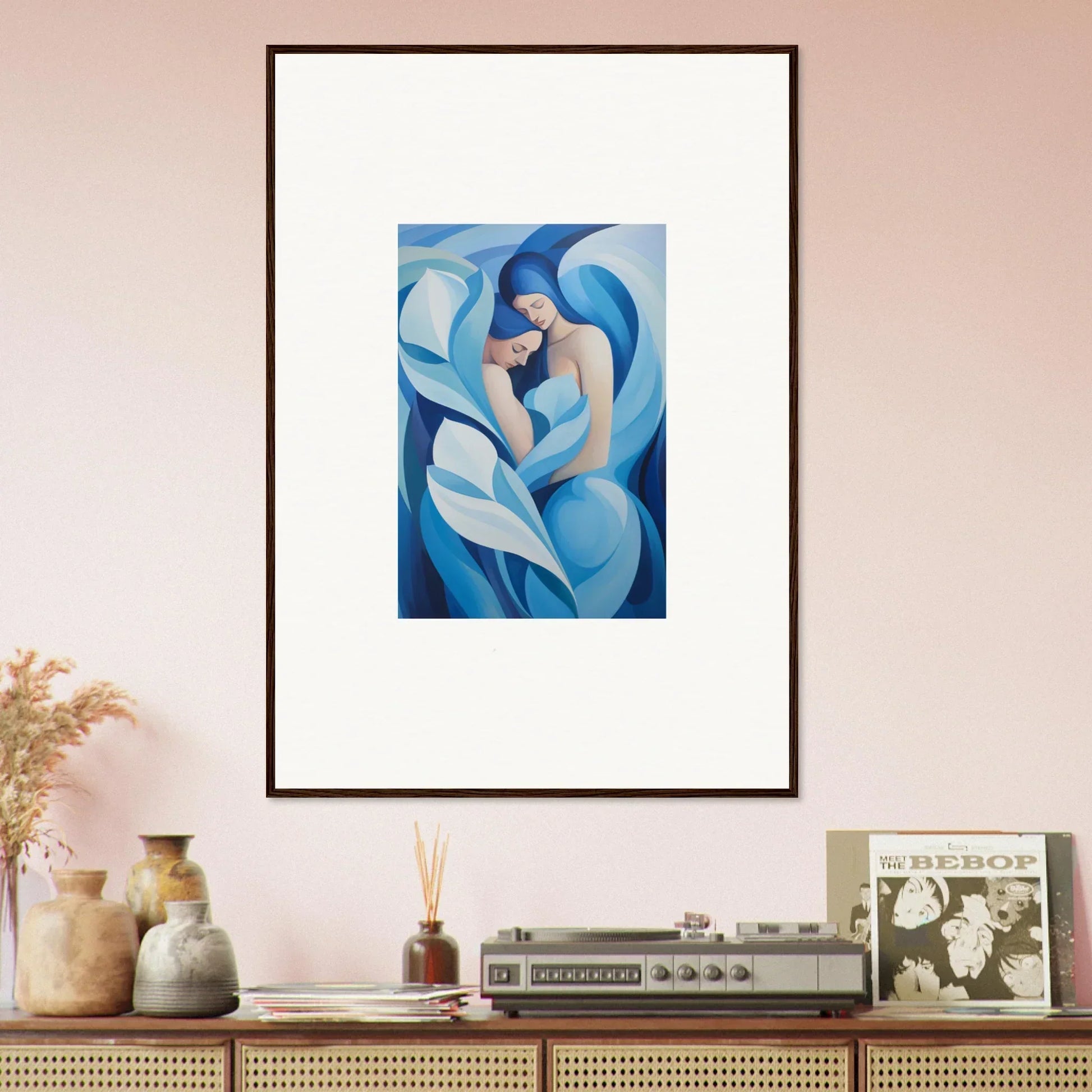 Framed abstract canvas print of swirling blue shapes for a euphoria embrace room decoration