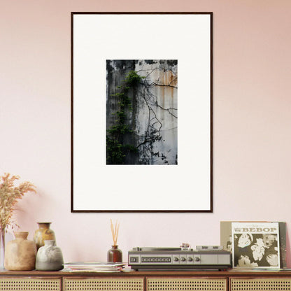 Framed wall art featuring a weathered wall with vines, perfect for room decor