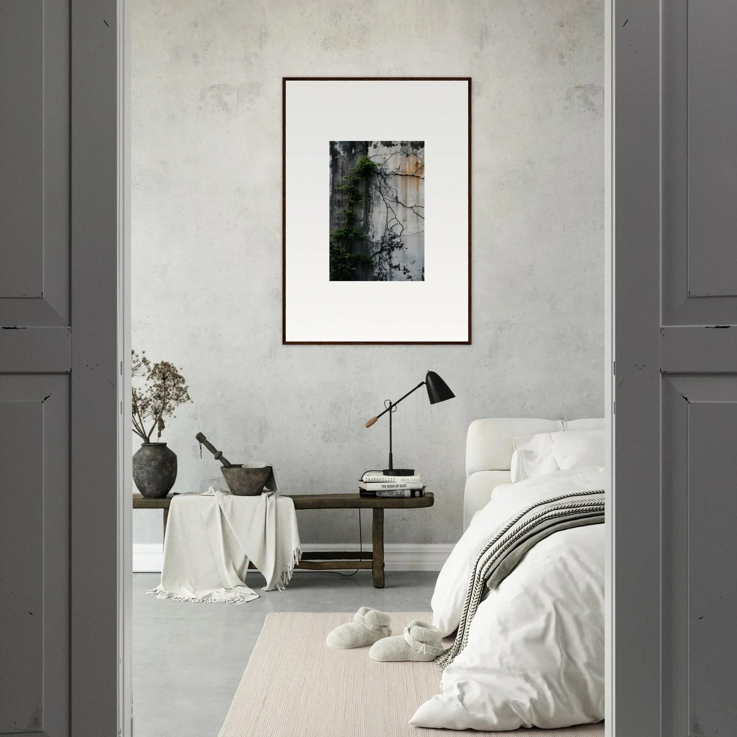 Minimalist bedroom featuring framed wall art as the focal point of stylish room decor