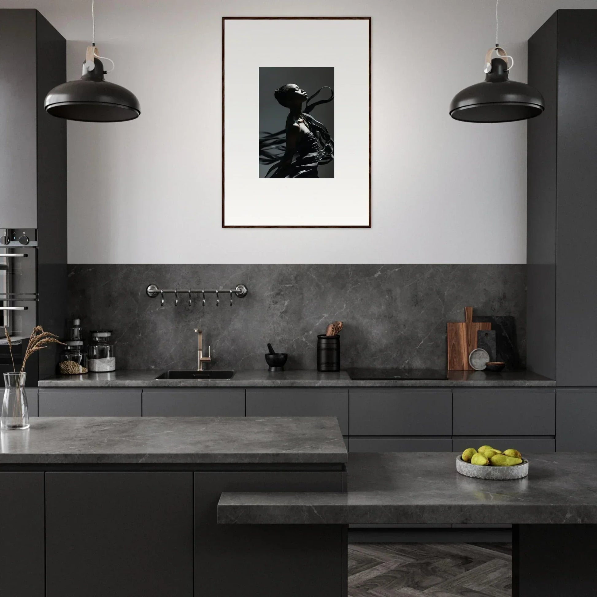 Modern, monochromatic kitchen with dark cabinetry and countertops.