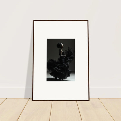 Framed black and white photograph of a flamenco dancer in motion.