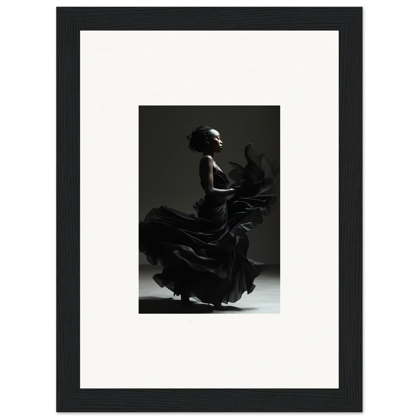 Silhouette of a flamenco dancer in a flowing dress, captured mid-motion.