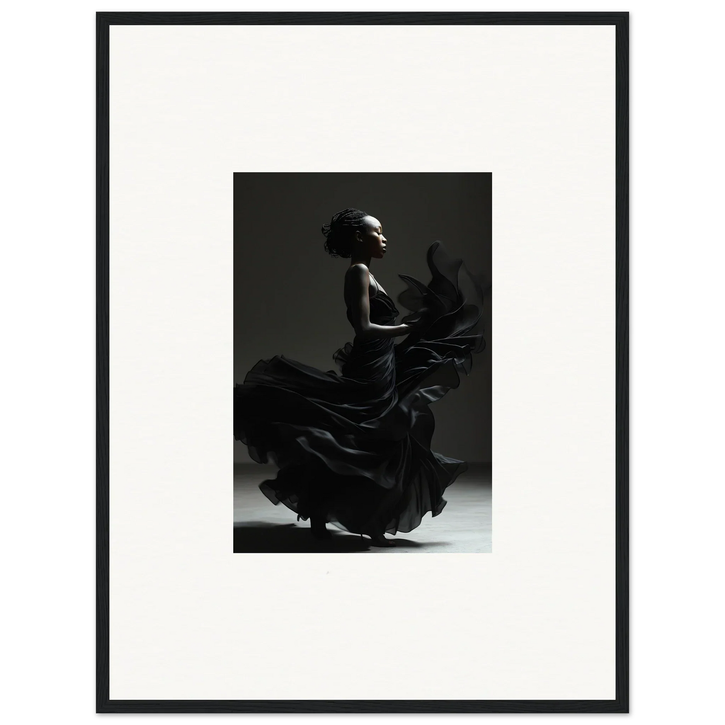 Silhouette of a flamenco dancer in a flowing dress, captured mid-motion.