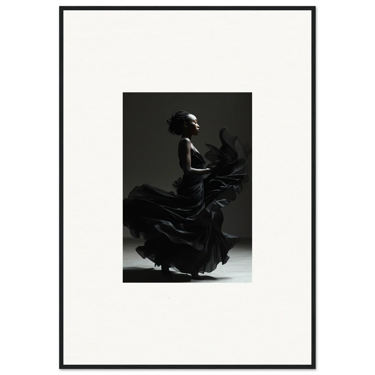 Silhouette of a flamenco dancer in a dramatic pose with a swirling dress.