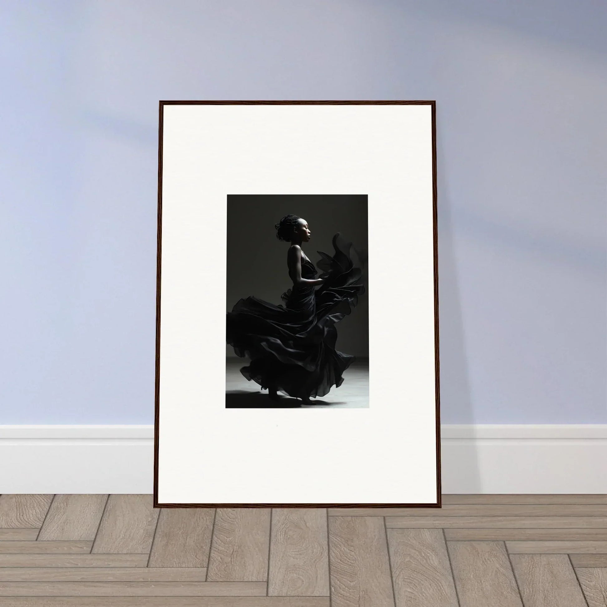 Framed black and white photograph of a flamenco dancer in motion.