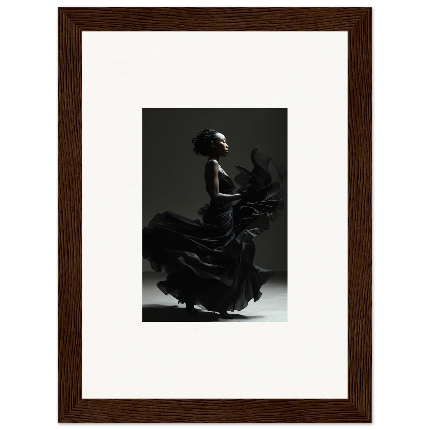 Black and white photograph of a flamenco dancer in motion, framed and matted.