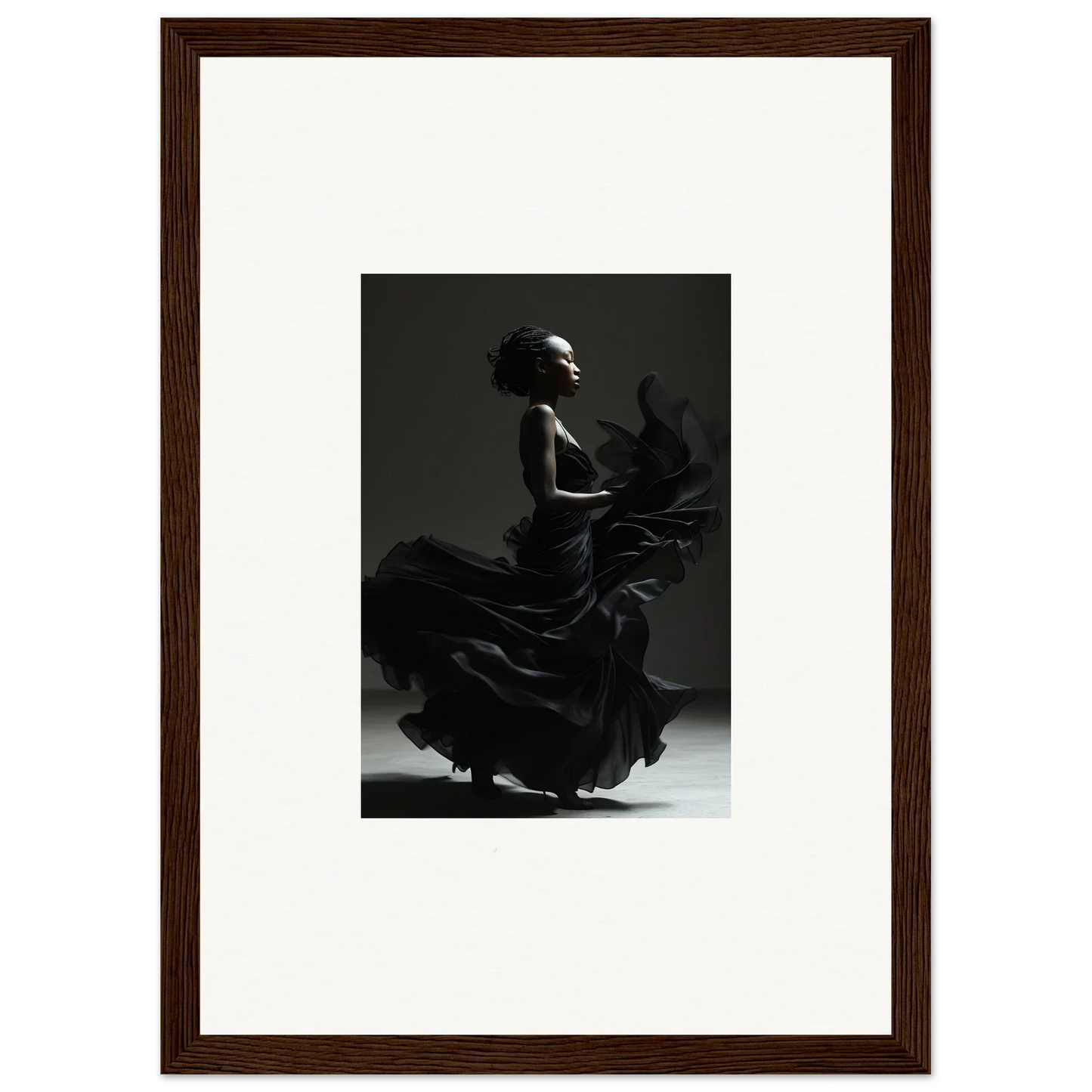 Silhouette of a flamenco dancer in dramatic motion, with a swirling dress.