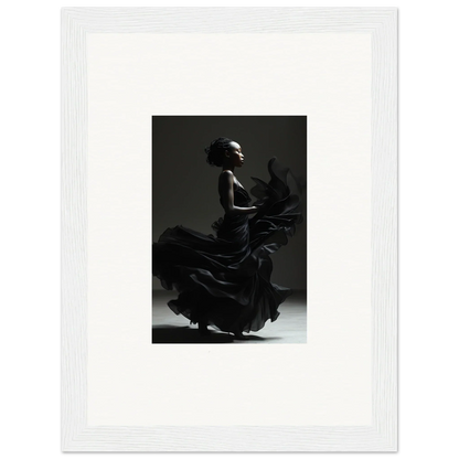 Silhouette of a flamenco dancer in a dramatic pose with a swirling dress.