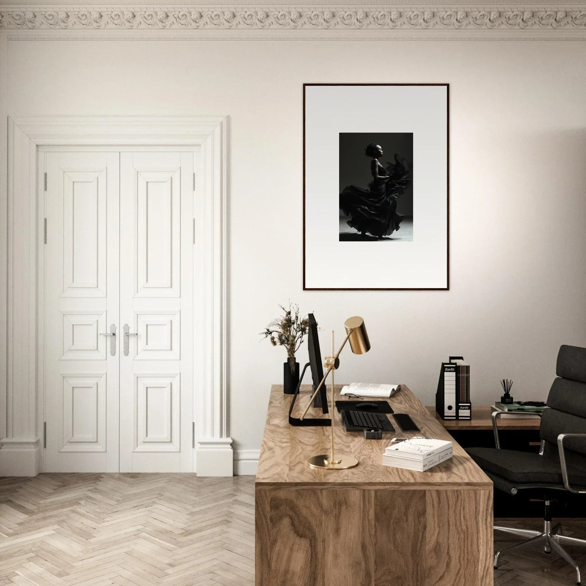 Wooden desk with a typewriter, books, and office supplies in a minimalist workspace.