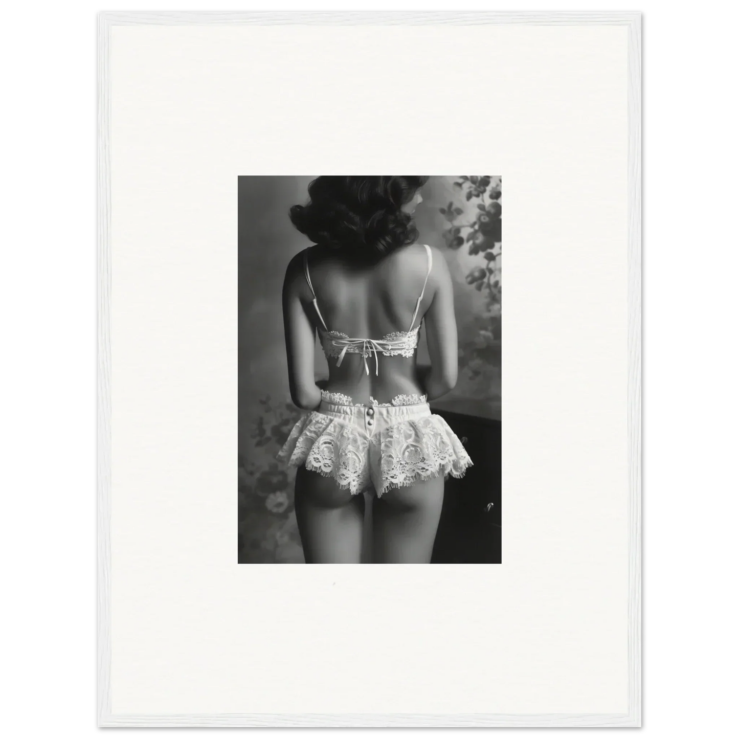 Black and white photograph of a woman in lacy lingerie, perfect for Silk Fawns wall art