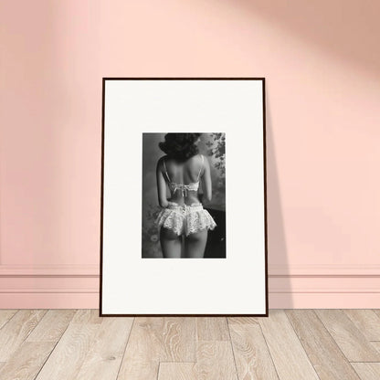 Framed black-and-white photograph of a person in silk fawns underwear for elegant room decor