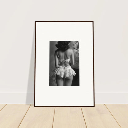 Framed black and white wall art of a person in a lacy garment for elegant room decor