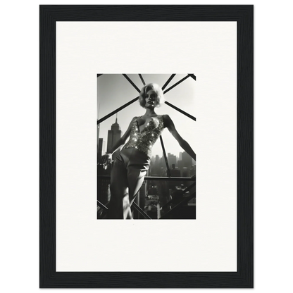 Black and white photograph of a performer on stage, framed and matted.