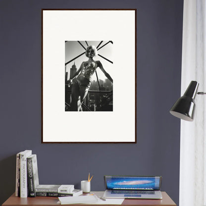 Framed black and white photograph of a performer on stage in an elaborate costume.